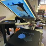 Custom colors screen-printing on-press at The Print Plug