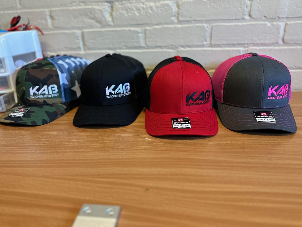 Bulk embroidered hats in various thread and hat colors at The Print Plug