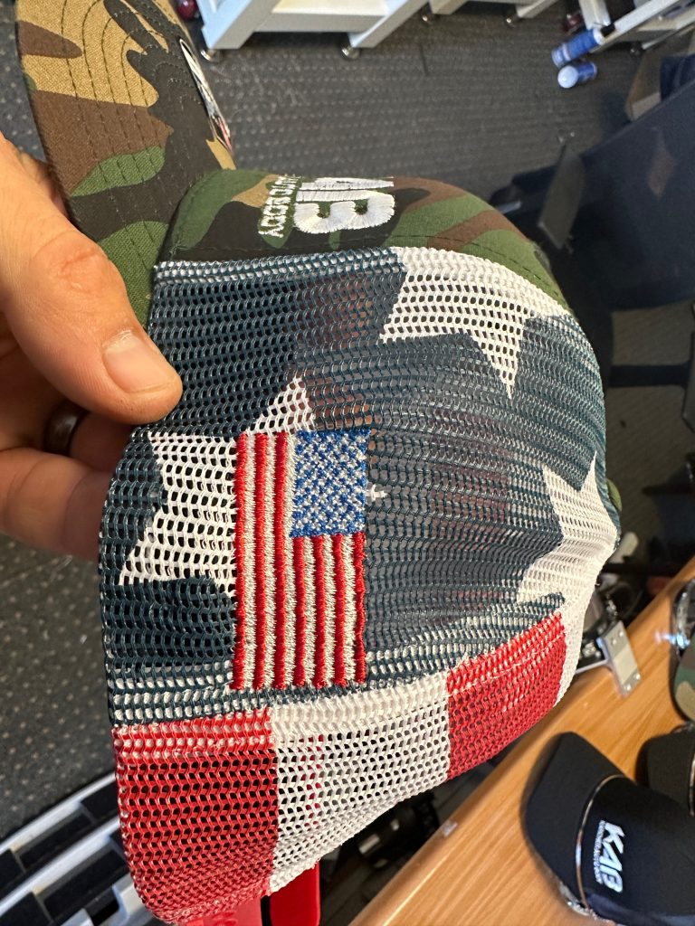 Baseball cap side panel embroidery of an American flag
