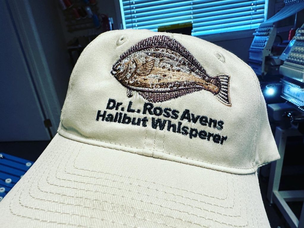 Custom embroidery design of a fish done on a dad hat as a unique personal gift