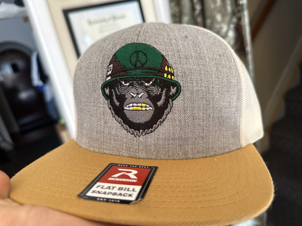 Custom urban gorilla design embroidered onto a Richardson flat bill hat