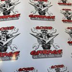 Gang sheet of custom die-cut vinyl stickers being printed in Nampa