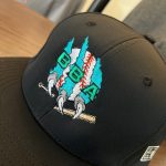 Custom embroidered hat for a local sports team from The Print Plug embroidery shop