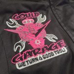 Logo embroidered on custom jacket for local garage company from The Print Plug embroidery shop in Nampa