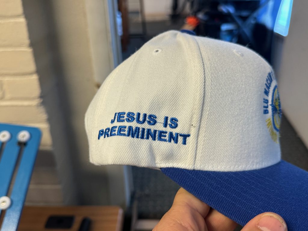 Custom embroidered hat with side placement for a local painting company in Nampa